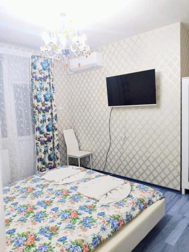 Guesthouse Jasmin TV 또는 엔터테인먼트 센터