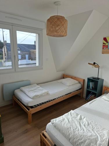 En eller flere senge i et værelse på Penvins
