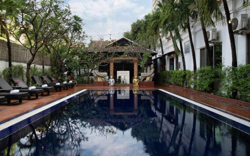 Piscina a Harmony Indochine d'Angkor o a prop
