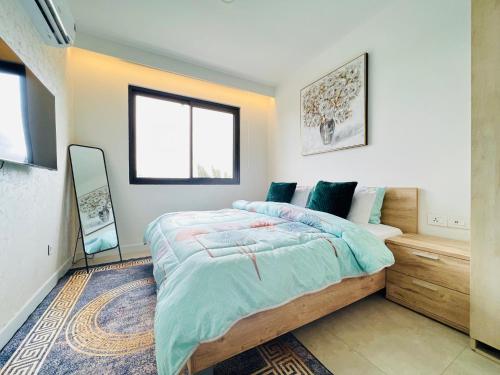 Luxury 1-Bedroom Apartment with Gym & Rooftop Pool - Airport Residential