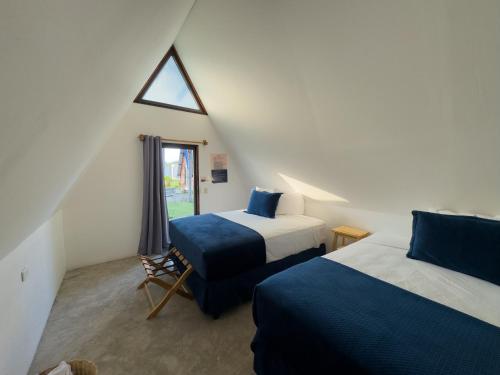 Llit o llits en una habitació de Arena Hostel