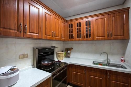 Chong Chong Guesthouse tesisinde mutfak veya mini mutfak