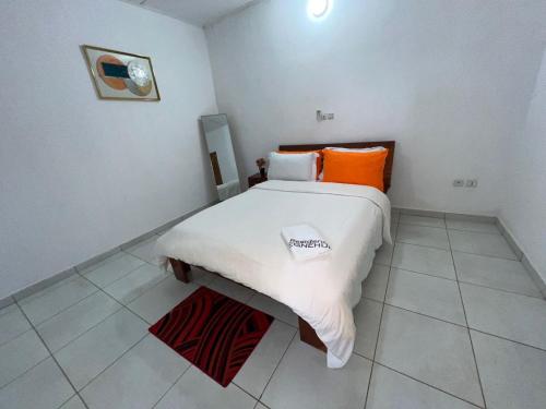 Llit o llits en una habitació de La Paix