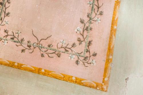 a painting of flowers on a wall at Hotel Villa Sermolli in Borgo a Buggiano
