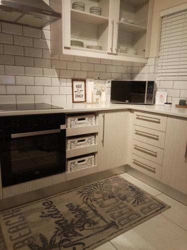 Kuchyň nebo kuchyňský kout v ubytování Haus Ayanda