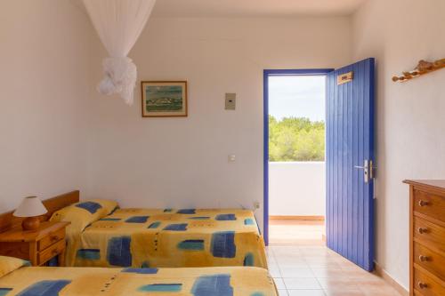 Postel nebo postele na pokoji v ubytování Hostal Mayans