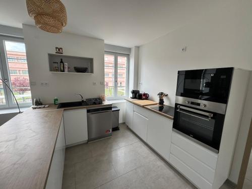 A kitchen or kitchenette at Les mimandes