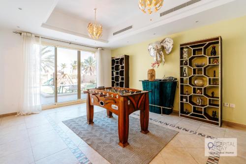 a game room with a foosball table at 5 Bedroom Villa with Pool - Near Al-Marjan Island in Ras al Khaimah