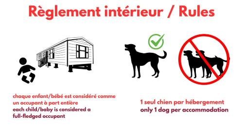 a sign that reads replacement interpretive rules with a dog at Camping Le Soleil des Landes in Lit-et-Mixe
