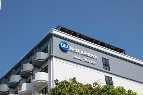 a building with a sign for a bilb system at Best Western Matter Tiwanon Hotel in Bangkok