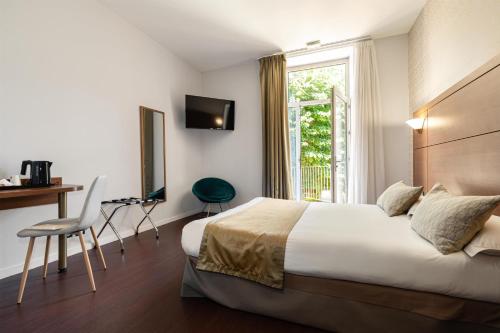 Кровать или кровати в номере Best Western Le Bristol