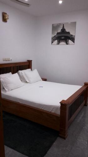 Llit o llits en una habitació de MANBOU Hotel