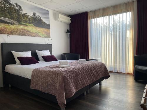 Krevet ili kreveti u jedinici u okviru objekta Wapen van Exloo