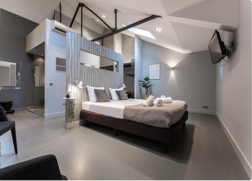 a bedroom with a large bed in a room at Suite w kitchen acces,Den bosch- Oss, near train in Oss