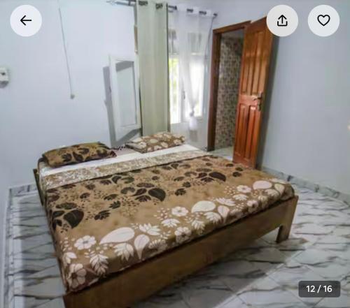 sypialnia z łóżkiem w pokoju w obiekcie Villa André 