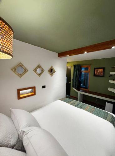 Llit o llits en una habitació de Toliman Room