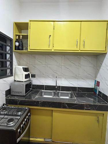 Cuina o zona de cuina de The Cozy Spot