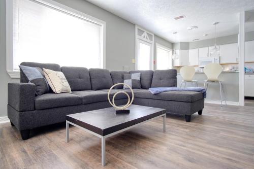 a living room with a couch and a coffee table at Explore Indy in Perfect Location - Cozy 1BR in Indianapolis