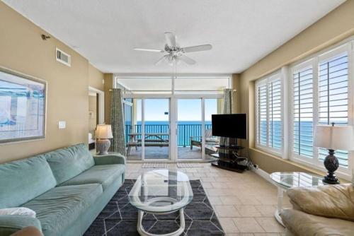 a living room with a couch and a table at Jade East Towers 1850 in Destin