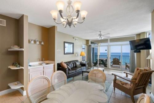 a living room with a couch and a table at Jade East Towers 0740 in Destin