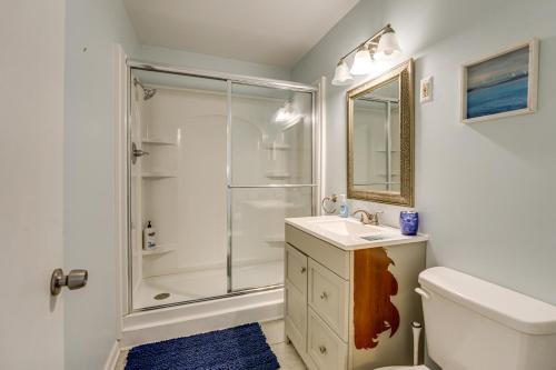a bathroom with a shower and a sink and a toilet at Woodsy & Charming! Applegate Cabin w/ Large Yard in Applegate