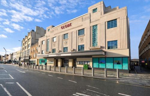 a building on the side of a street at The Stockton Apartment by GR Estates in Stockton-on-Tees