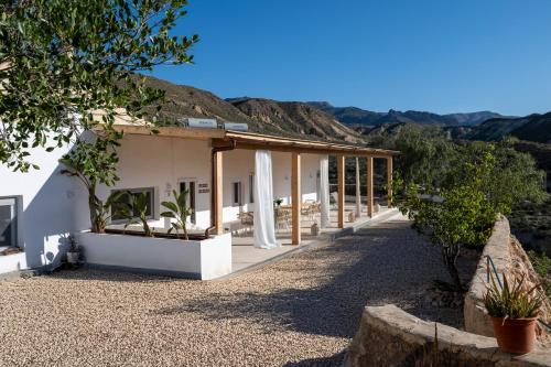 a view of a building with mountains in the background at Casa Ubedas in Almería