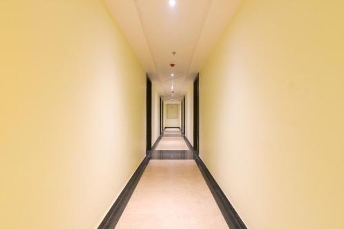 an empty corridor in an office building at Super OYO 77736 Hotel Starlight in Kānpur