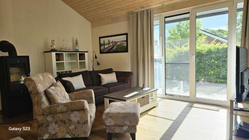 a living room with a couch and a chair at Andreas in Lenz