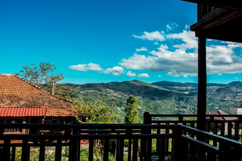 a view of the mountains from the porch of a house at Theasis suites-Ορεινή Φιλοξενία in Kato Trikala Korinthias