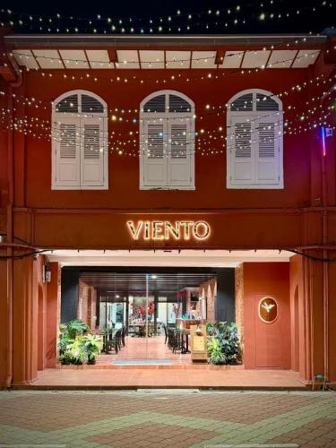 a view of the entrance to a vittoria store at VIENTO RedHouse Melaka by Rest Collection in Malacca