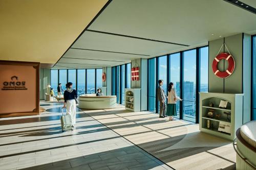 a rendering of the lobby of a condominium at OMO5 Yokohama Bashamichi by Hoshino Resorts in Yokohama