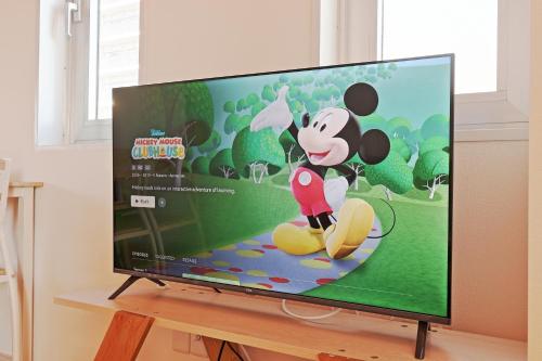 a television screen with a mickey mouse playing a video game at V Close to Kojiya sta 15 min to Haneda Roof top B in Tokyo