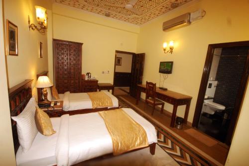 Cama o camas de una habitación en Rajputana Haveli - Jaipur