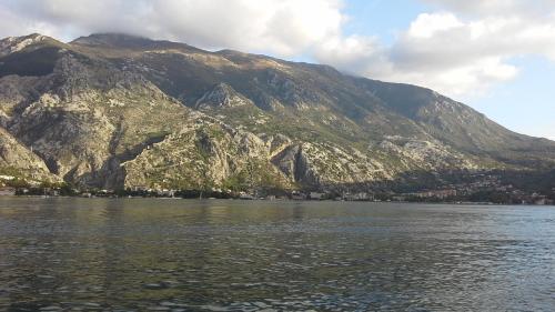 a view of a mountain with a body of water at Apartment Radovic in Kotor