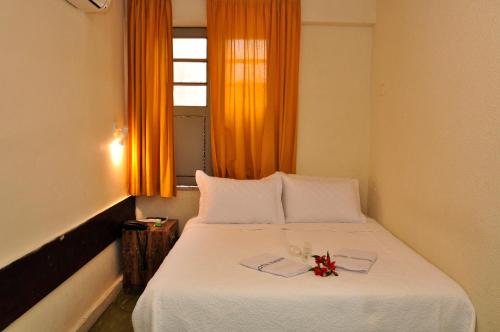 Säng eller sängar i ett rum på Hotel Plaza Riazor