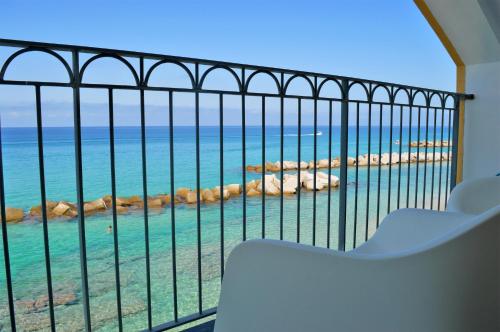 a view of the ocean from a balcony at Marina Holiday Home in Pizzo