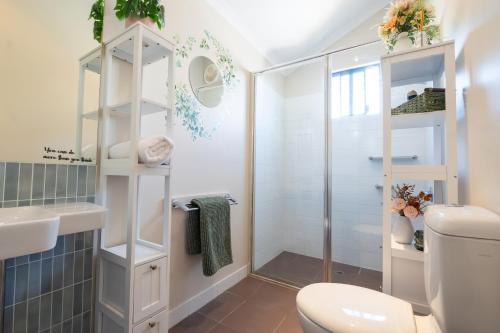 a bathroom with a shower and a toilet at Serenity & Sea at Preston Beach WA in Preston Beach