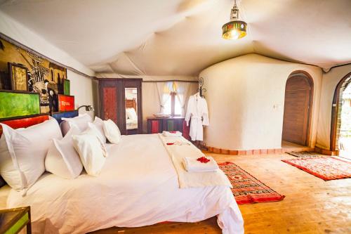 Llit o llits en una habitació de Riad Lamane
