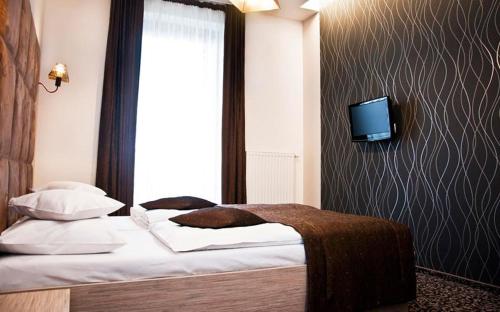 Cama o camas de una habitación en Hotel Vis A Vis