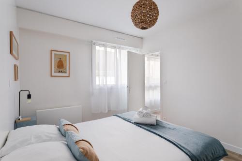 Llit o llits en una habitació de Le Triskel