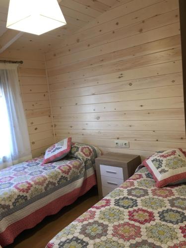 Postel nebo postele na pokoji v ubytování La Escapada