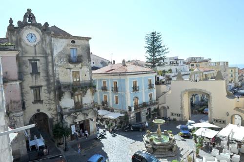 an aerial view of a city with a clock tower at B&B Rosy in Paola