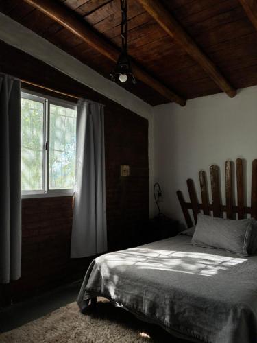 Llit o llits en una habitació de Apartamento Cerrito