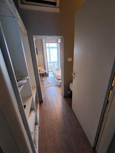 a hallway with a room with a door and a floor at Il Roseto in Frosinone