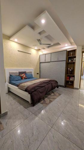 a bedroom with a bed in a room at Chill pad in Dehradun