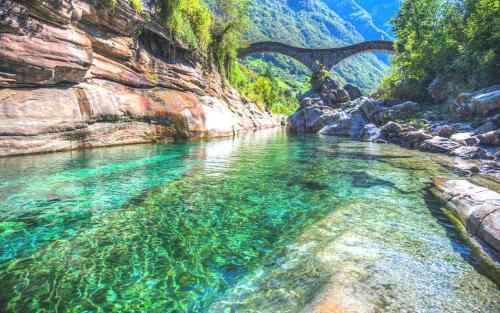 an image of a river with a bridge at MyVerzasca Boutique Hotel in Brione