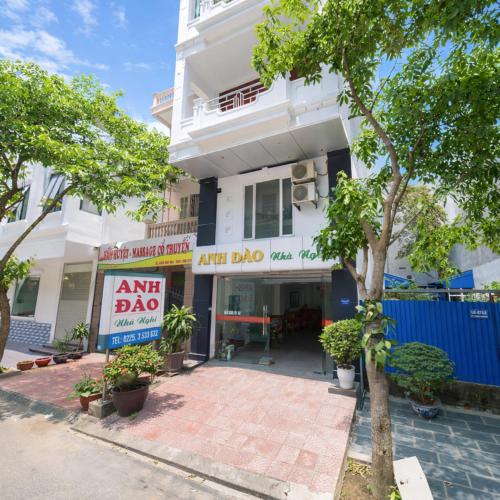 an art dao building with a sign in front of it at Anh Đào 2 Hotel in Hai Phong