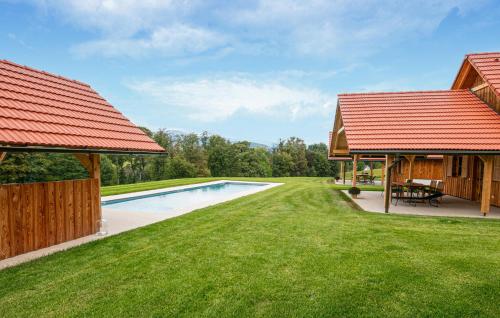 an image of a house with a swimming pool in the yard at Chalet In Stainz in Stainz