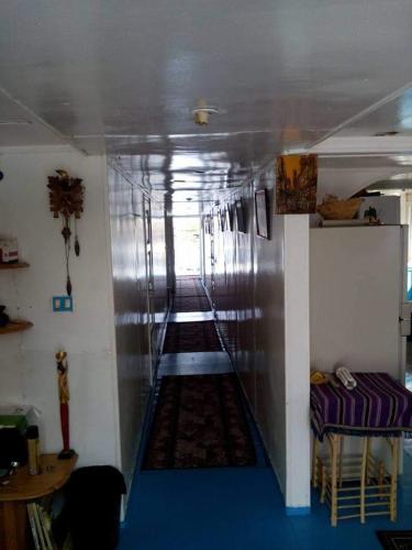 a hallway of a room with a long stairway at Nile Dream Yacht in Jazīrat Salūjah